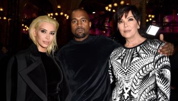Kim Kardashian, Kris Jenner, and Kanye West attend Balmain show during Paris Fashion Week