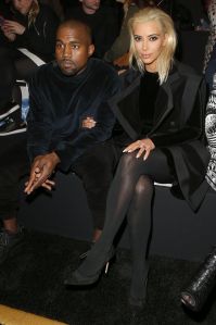 Kim Kardashian and Kanye West attend Balmain show during Paris Fashion Week