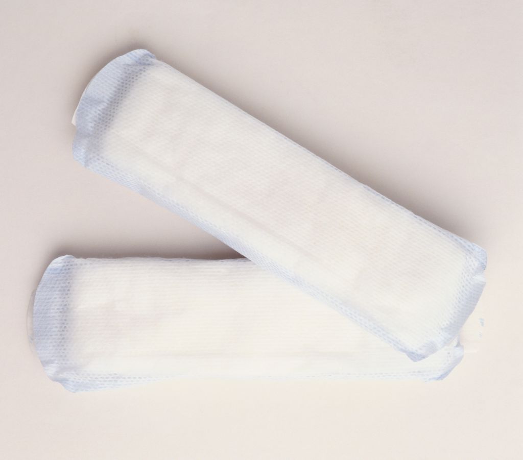 Two sanitary towels, close up.