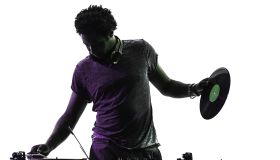one disc jockey man in silhouette on white background