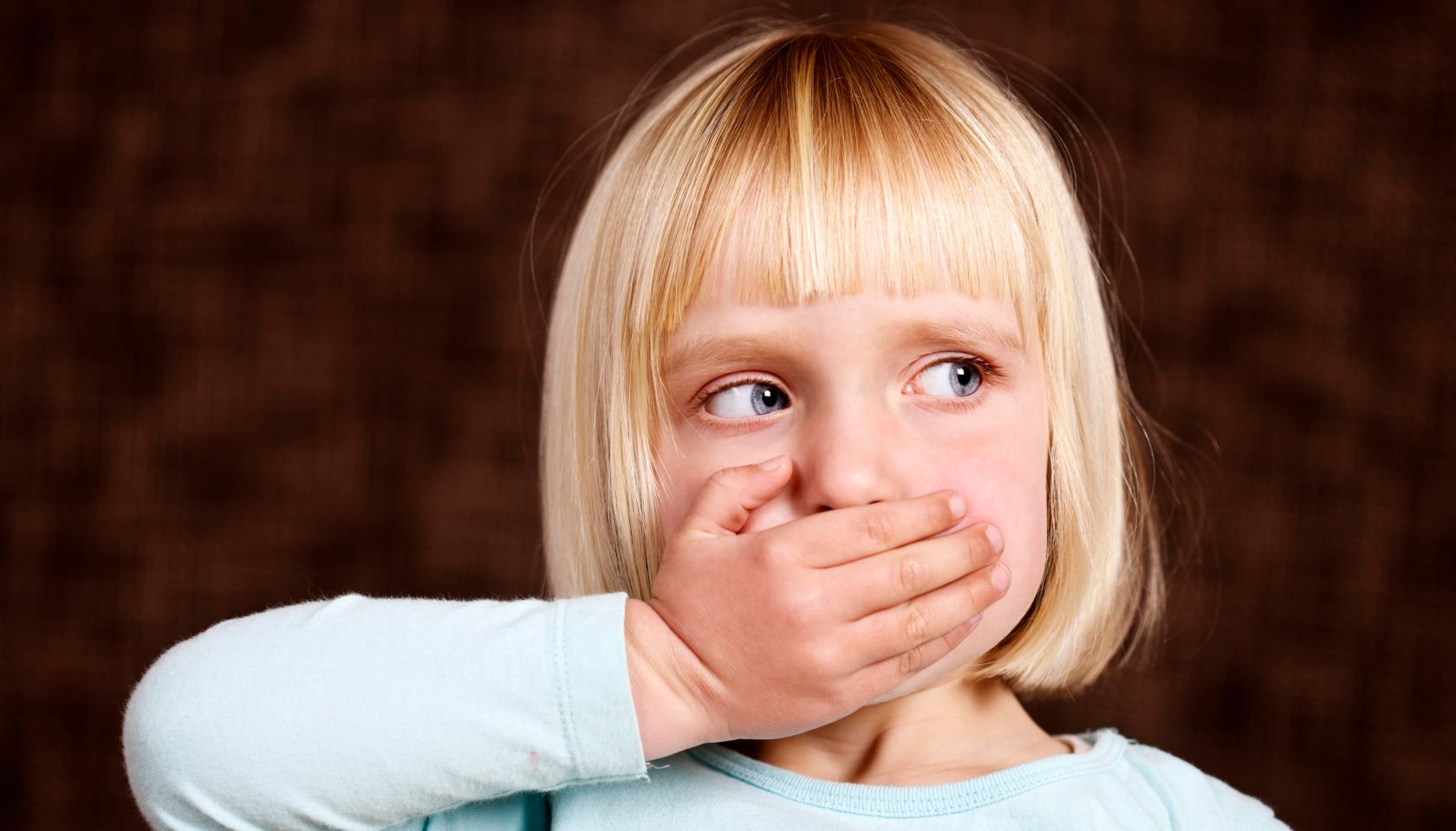 Beautiful blonde toddler makes 'Speak no Evil' sign