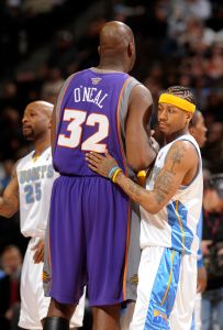 (KG NUGGETS_SUNS -- Nuggets guard Allen Iverson exchanged pleasantries with Phoenix center Shaquille O'Neal before Wednesday's matchup in Denver. The Denver Nuggets hosted the Phoenix Suns Wedensday, March 5, 2008 at the Pepsi Center. The Denver Post/ Kar