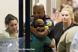 DART police officer cries at Hospital After Dallas Shooting