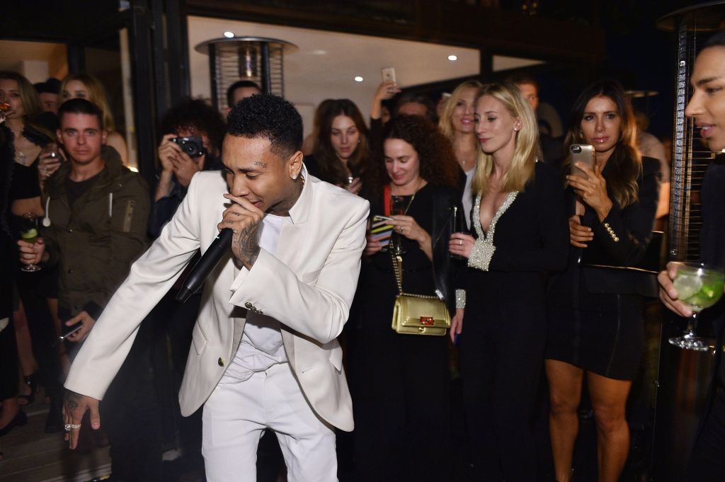 Tyga surprised Balmain's creative director, Olivier Rousteing, with a live performance at his 30th birthday celebration