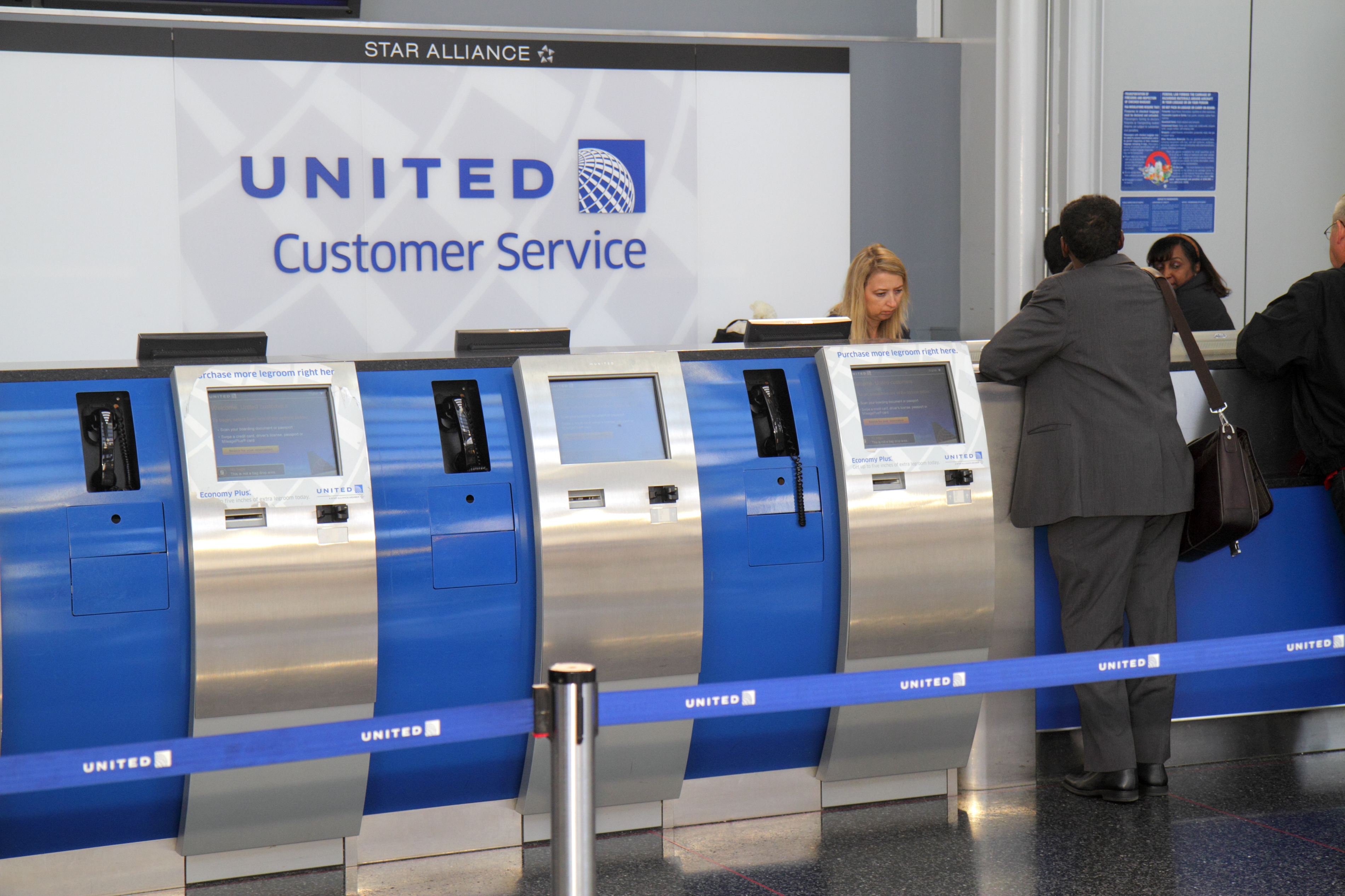 Chicago O'Hare International Airport terminal, United Airlines customer service counter