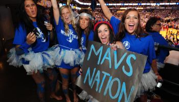 Fans of the Dallas Mavericks cheer befor