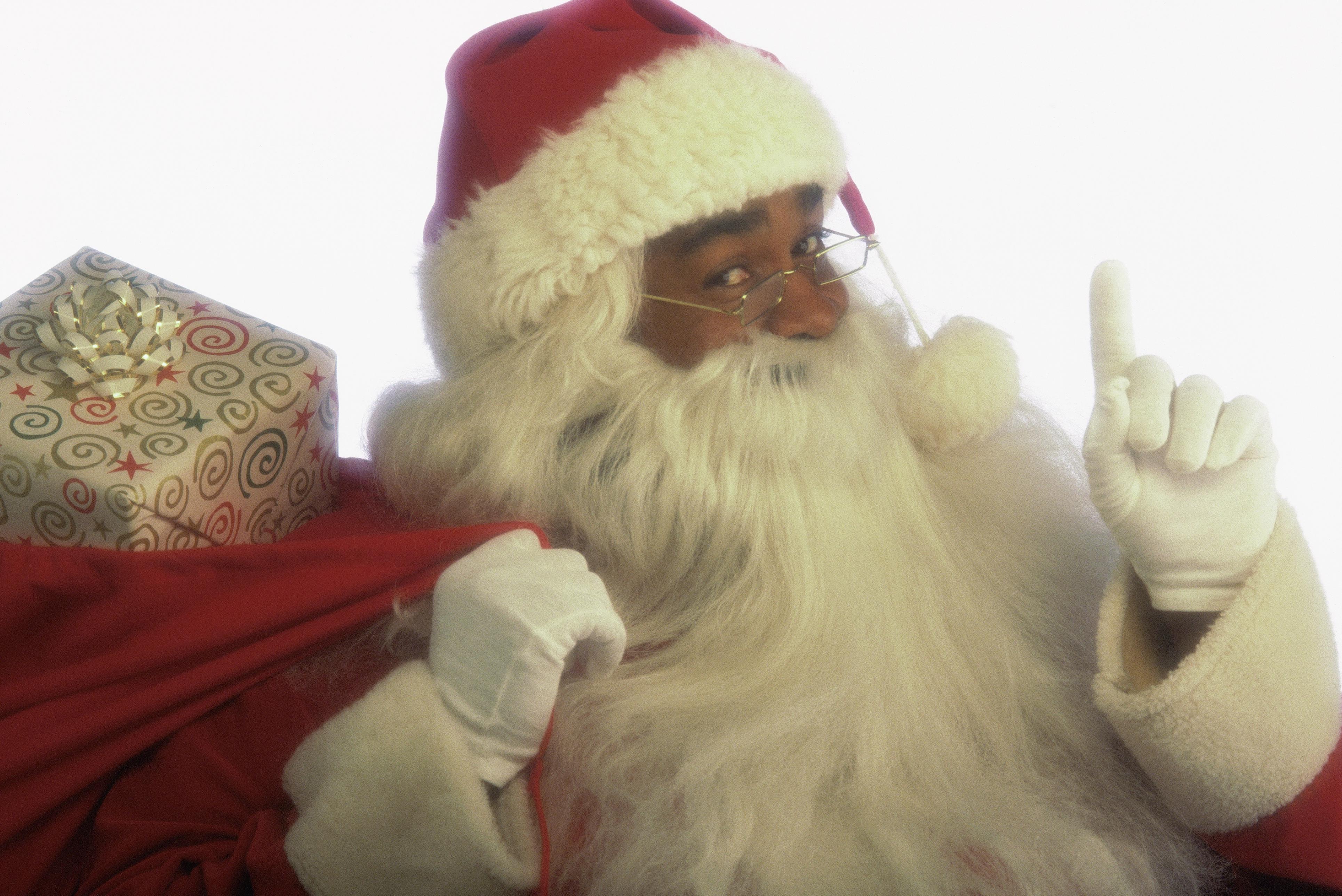 Santa holding bag of gifts