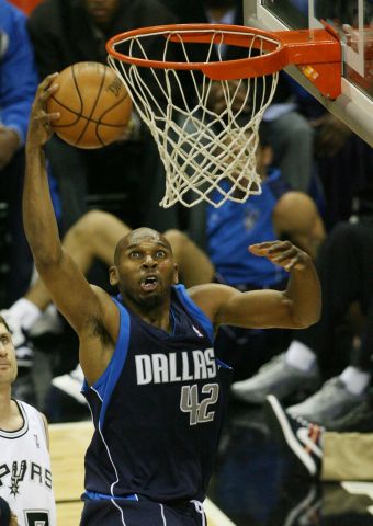 The Dallas Mavericks' Jerry Stackhouse goes up for a baskets
