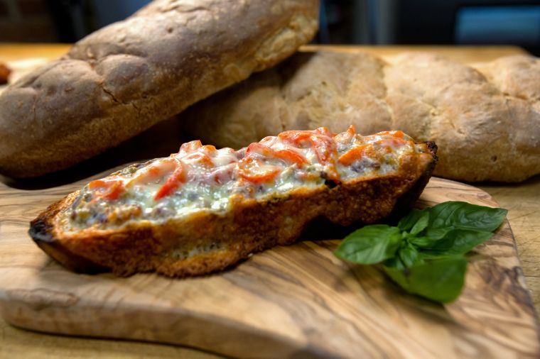 Grilled Italian Veggie Melted Cheese Sandwich on a Cutting Board