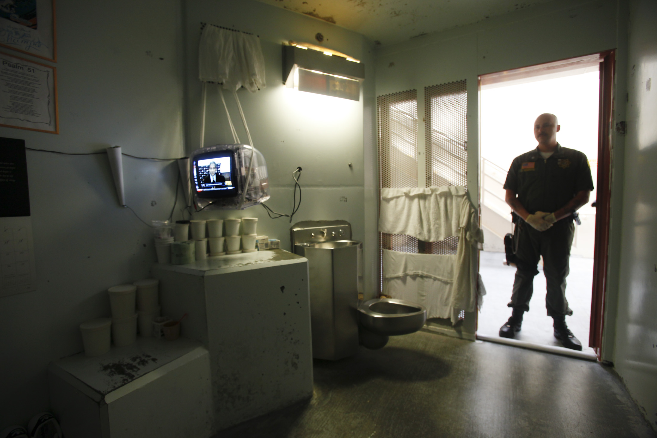 A guard stands in the doorway of one of the Secure Housing Unit (SHU) at Pelican Bay State Prison i