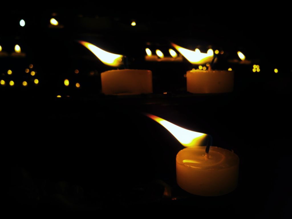 Candles Burning In Church