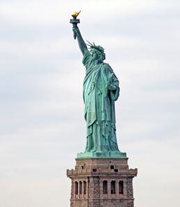 Three quarter view of the Statue of Liberty on Liberty Island in New York Harbor, New York City