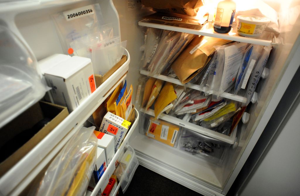 LPD25-- DNA, mostly rape kits, are cramped into the refrigerator at Littleton Police Department Department, on W. Berry Ave in Littleton, The department is planing a much needed expansion. RJ Sangosti/ The Denver Post