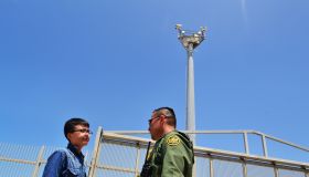 A visitor seen talking to a Border Patrol agent in...