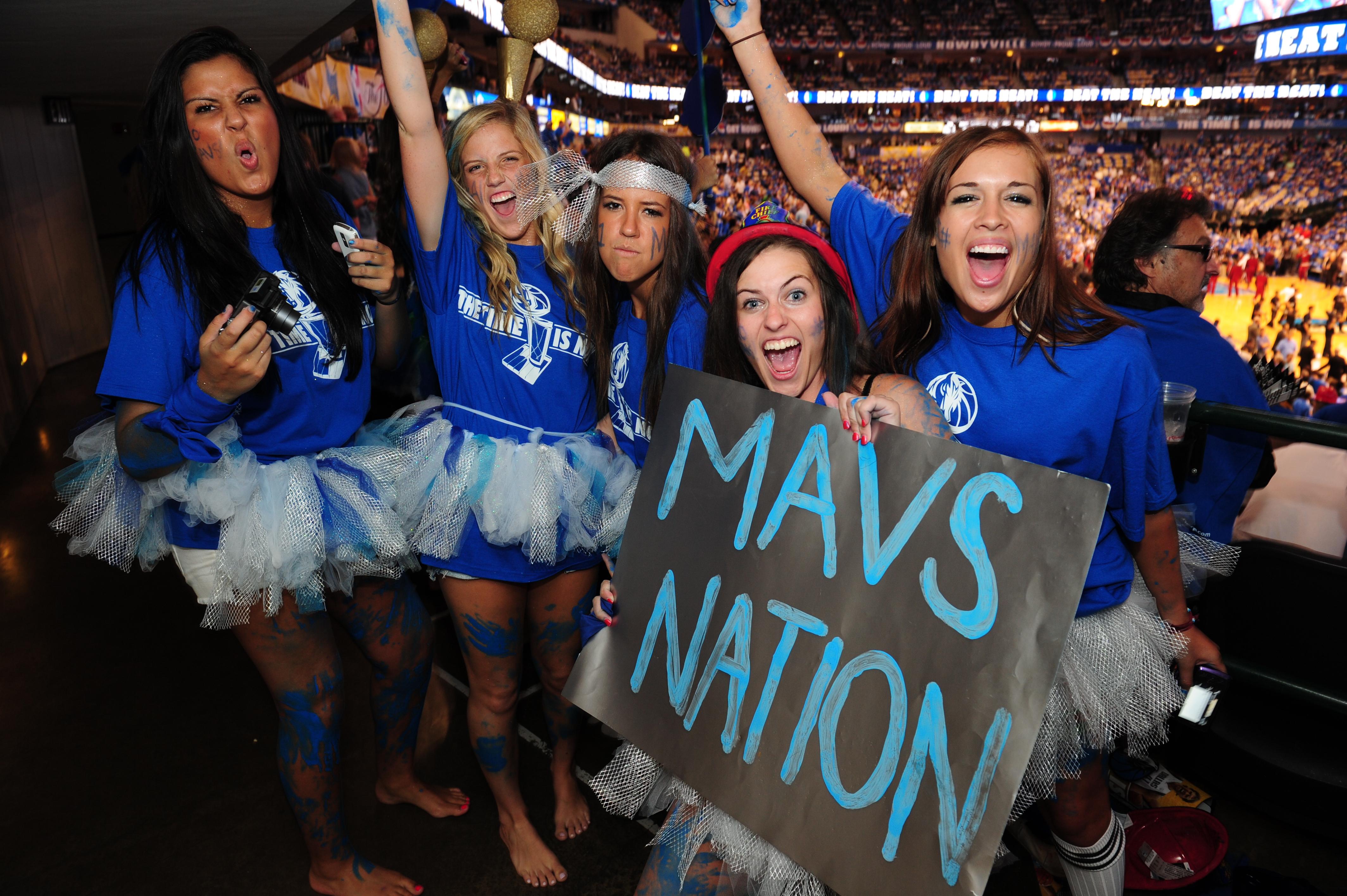 Fans of the Dallas Mavericks cheer befor