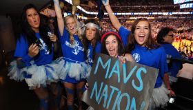 Fans of the Dallas Mavericks cheer befor