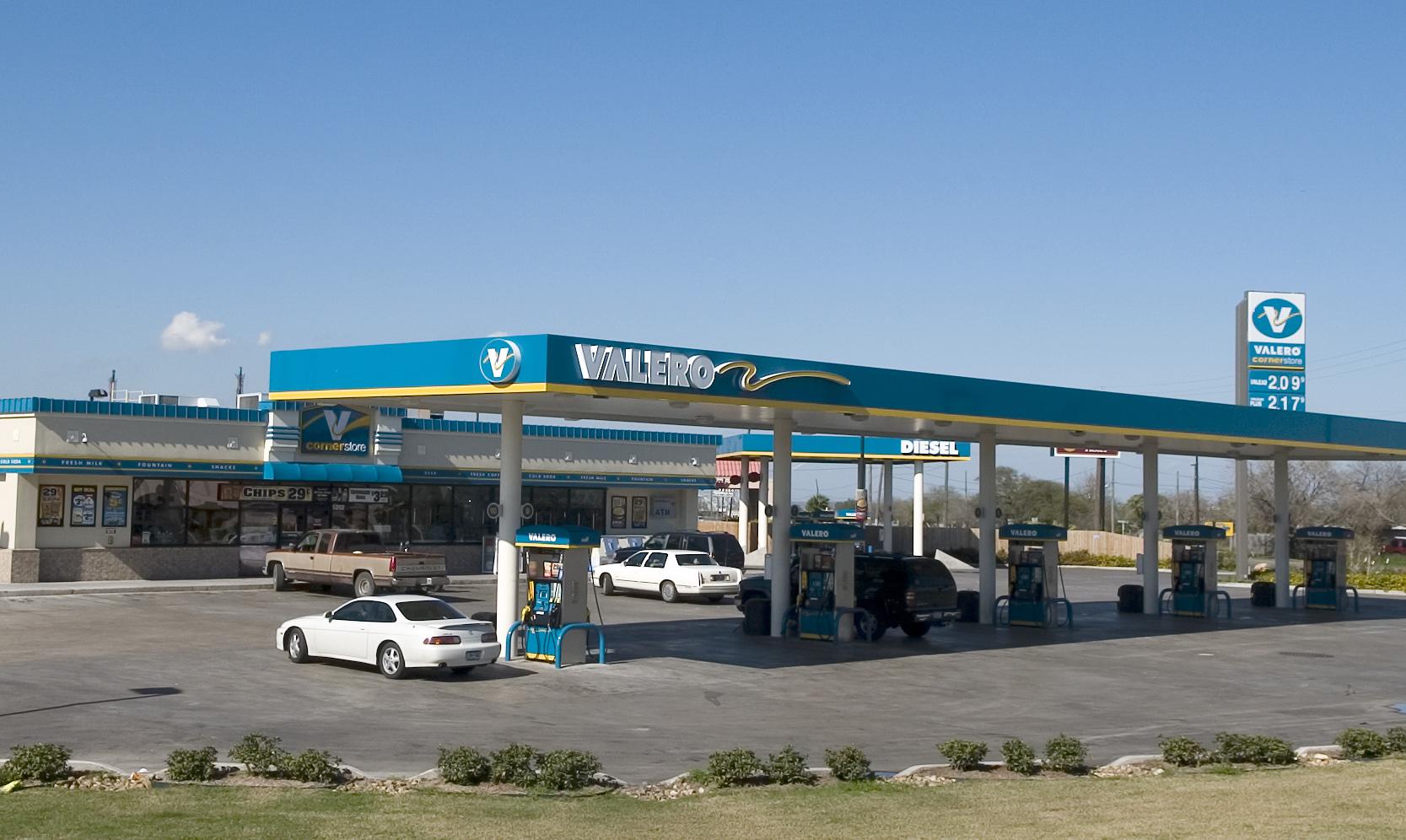 Patrons fill up with gasoline and visit the convenience stor