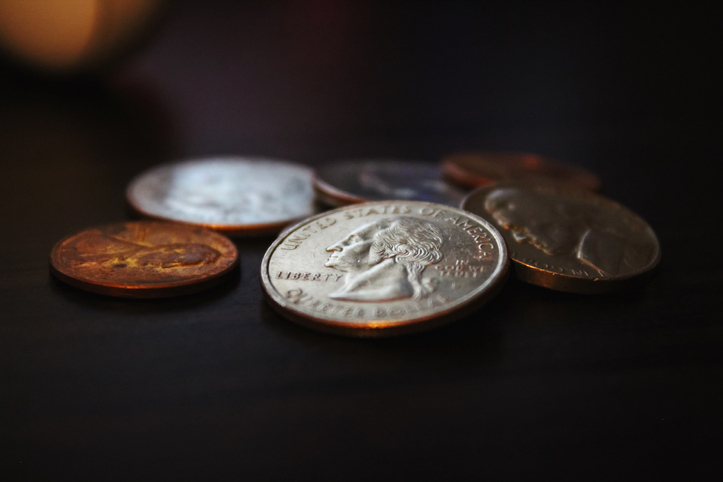 Close-Up Of Coins On Table