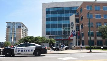 A Dallas Police car on South Lamar Street in front of Dallas Police headquarters on 8th July, 2016