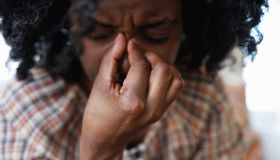 Woman Suffers From Sinus Headache