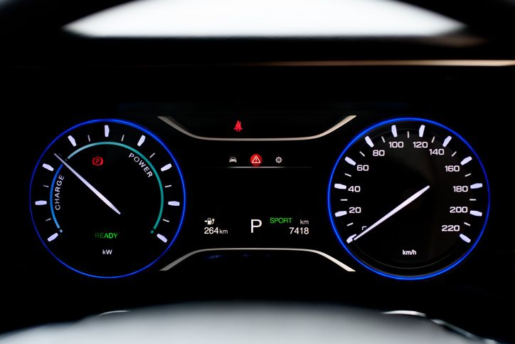 Close-Up Of Illuminated Dashboard In Electric Car