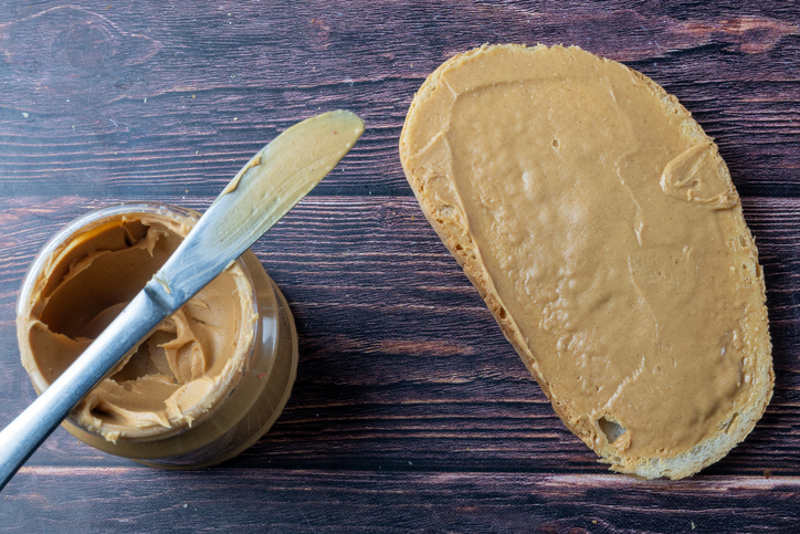Peanut butter on bread slice
