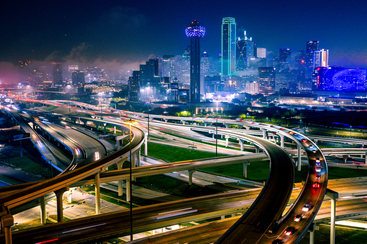 Aerial Drone over downtown Dallas, Texas at night