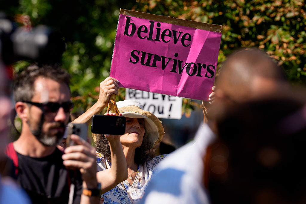 Rally Held Outside U.S. Capitol In Solidarity With Epstein Victims