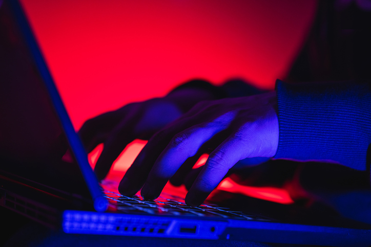 Typing on keyboard. Neon light