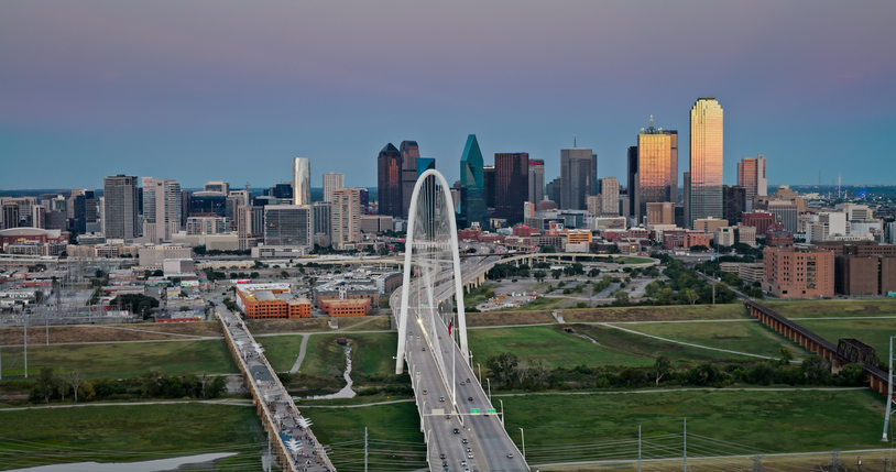 Aerial View of Downtown Dallas Skyline with Margaret Hunt Hill Bridge at Sunset