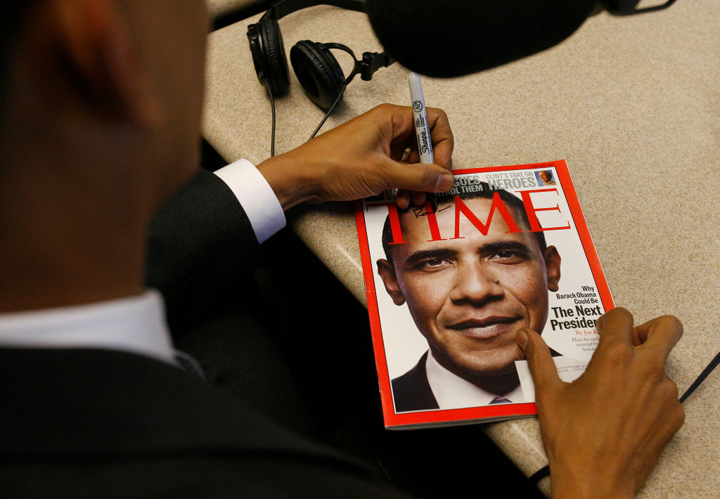 obama_185_mac.jpg Senator Obama signs a copy of a Time magazine with his picture on the cover. Senator Barack Obama, D. Illinois, possible presidential candidate, in San Francisco today stopping KGO studios for an interview, an hour on the Ronn Owens rad