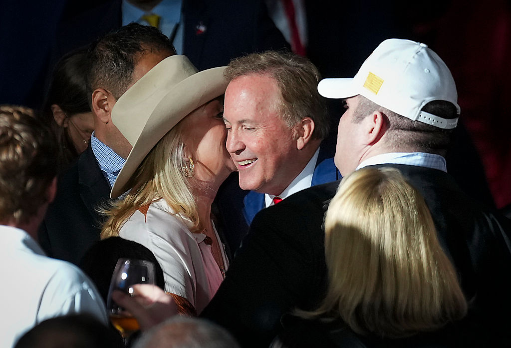 Ken Paxton celebrates with supporters primary election
