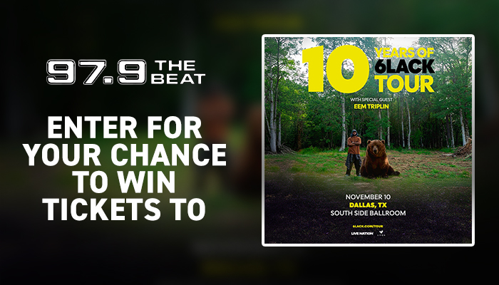 97.9 The Beat radio station logo and text "Enter for your chance to win tickets to 10 Years of Black Tour" with an image of two bears in a forest.