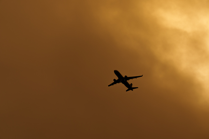 Silhouette of a Passenger Airplane Stranded in a Massive Desert Dust Cloud Over Antalya, Turkey, during High Heatwave