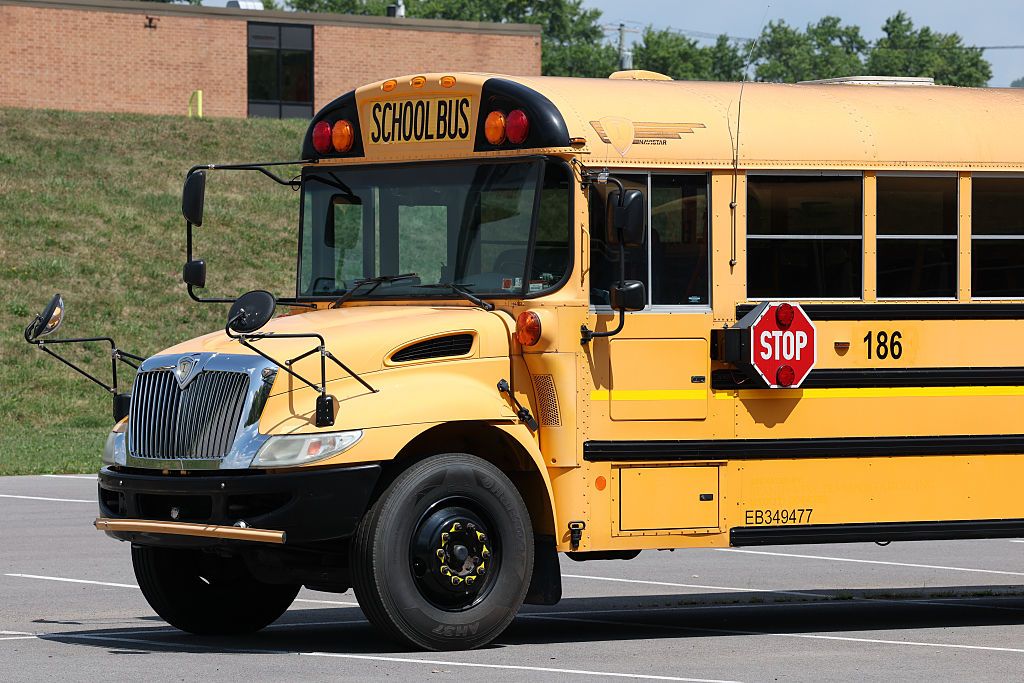 A yellow school bus is seen on the campus of Bloomsburg Area